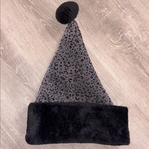 Fuzzy Leopard Santa Hat